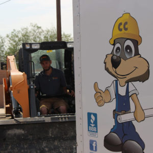 John Driving Heavy Equipment